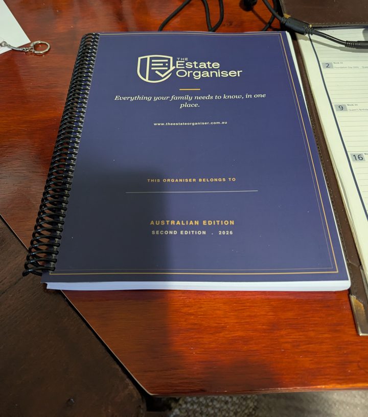 A reader's printed copy of The Estate Organiser on her desk